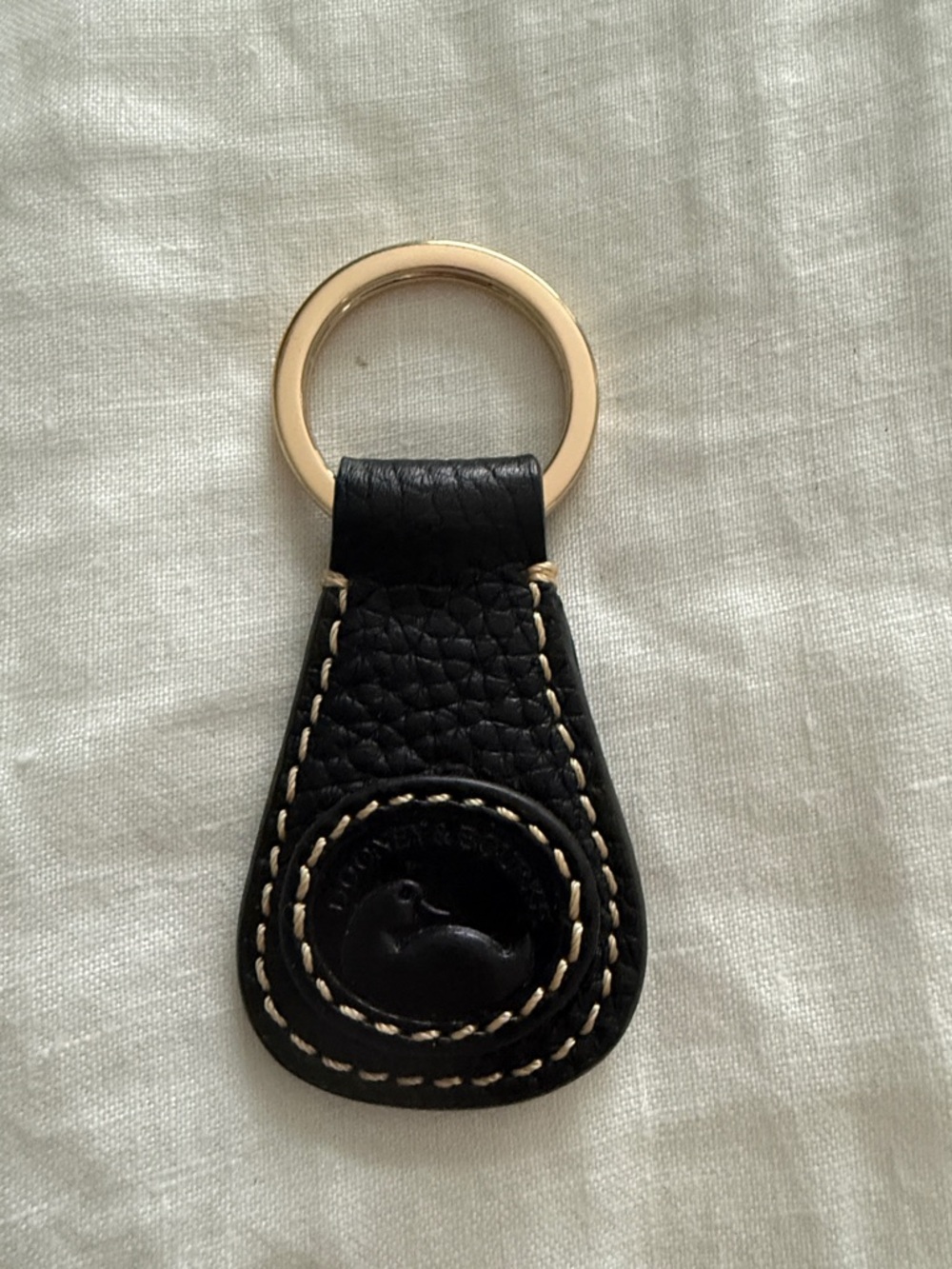 Dooney & Bourke Black Pebbled Leather Key Fob with Cream Stitching